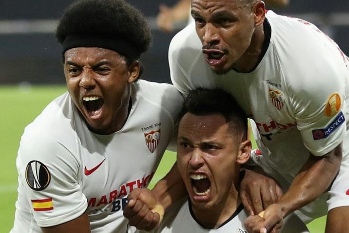 Lucas Ocampos (C) sent Sevilla to the Europa League semi-final with a late header that saw off Wolves