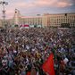 Thousands rallied in central Minsk waving the red-and-white flags of the opposition and calling on Lukashenko to step down