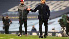Manchester City boss Pep Guardiola (right) and Liverpool boss Jurgen Klopp shared the spoils in a 1-1 draw at the Etihad