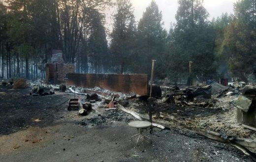 A burned out house is seen after the passing of the Holiday Farm fire in McKenzie Bridge, Oregon
