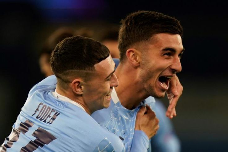 Phil Foden (left) and Ferran Torres (right)combined for Man City's third goal