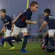 Stars of the future? Boys with the under-12 group train at the Paris Saint-Germain (PSG) Football Academy in Doha on the eve of the Champions League final