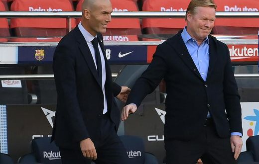 Zinedine Zidane (left) and Ronald Koeman (right) greeting each other at the Clasico on Saturday.