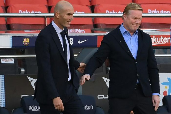 Zinedine Zidane (left) and Ronald Koeman (right) greeting each other at the Clasico on Saturday.