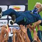 Flamengo players tossed 65-year-old coach Jorge Jesus into the air after clinching the Rio de Janeiro state title in an empty Maracana