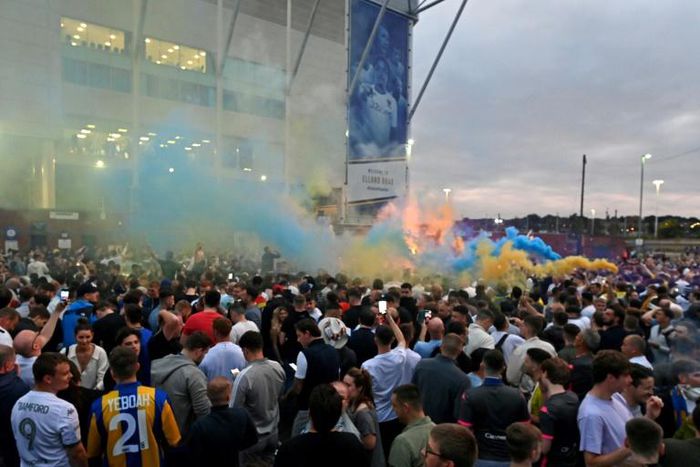 Leeds United supporters gathered outside Elland Road to celebrate promotion