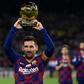 Lionel Messi shows his sixth Ballon d'Or to fans at the Camp Nou stadium in Barcelona in December last year