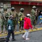 Ecuadorean soldiers wearing facemasks take part in a coronavirus public education operation in the capital, Quito