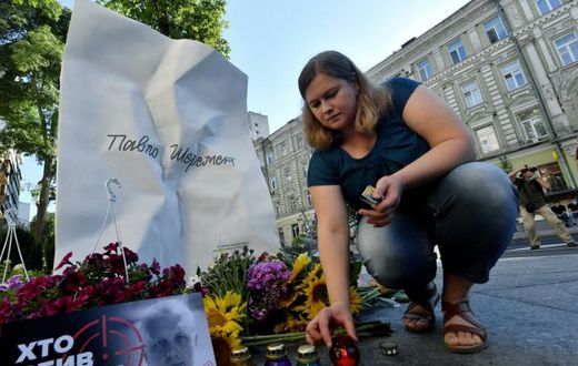 A memorial to journalist Pavel Sheremet on the site where his car exploded in July 2016.