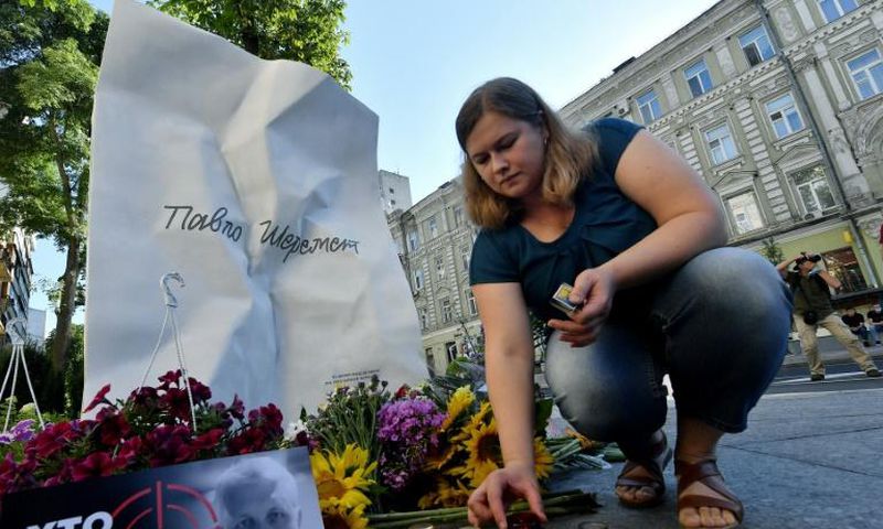 A memorial to journalist Pavel Sheremet on the site where his car exploded in July 2016.