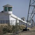 Watchtowers on a high-security facility near an alleged "re-education" camp for Muslim ethnic minorities outside Hotan in China's Xinjiang region