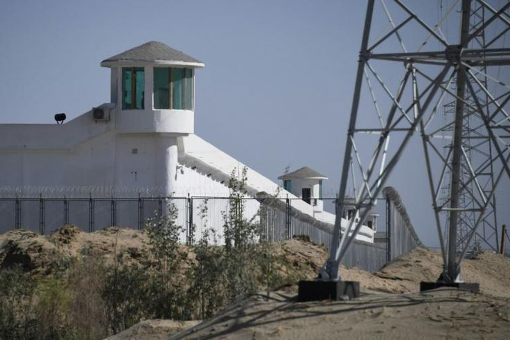 Watchtowers on a high-security facility near an alleged "re-education" camp for Muslim ethnic minorities outside Hotan in China's Xinjiang region