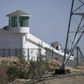 Watchtowers on a high-security facility near an alleged "re-education" camp for Muslim ethnic minorities outside Hotan in China's Xinjiang region