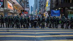 Police patrol after protesters rallied in Hong Kong to protest against the government's decision to postpone the legislative council elections