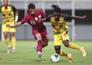 Gideon Mensah in action against Qatar