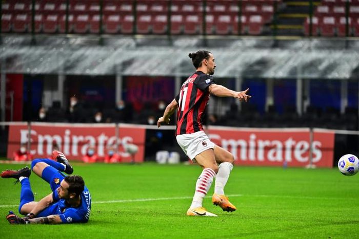 Double quick: AC Milan's Zlatan Ibrahimovic celebrated as the ball bounced into Antonio Mirante's net in the second minute