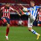 Atletico Madrid named Argentinian forward Angel Correa (L) as one of two players who had tested positive for coronavirus