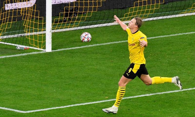 On target: Dortmund's Erling Braut Haaland celebrates scoring