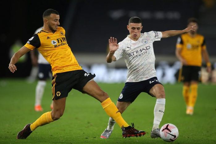 Manchester City midfielder Phil Foden (R) scored in his side's win at Wolves