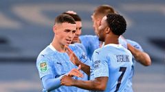 Phil Foden (left)scored the winner as Manchester City remained in contention for a fourth straight League Cup