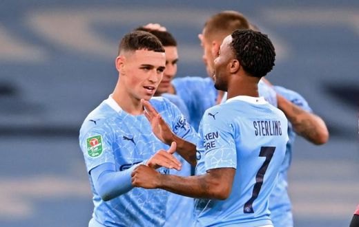 Phil Foden (left)scored the winner as Manchester City remained in contention for a fourth straight League Cup