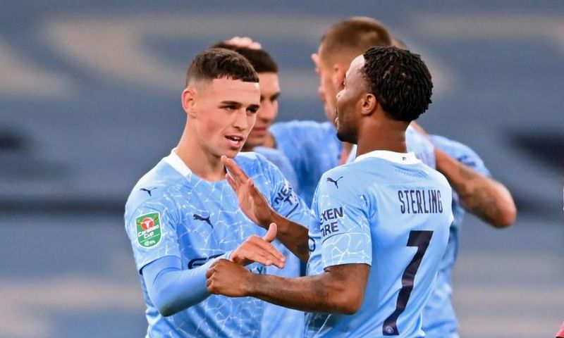 Phil Foden (left)scored the winner as Manchester City remained in contention for a fourth straight League Cup
