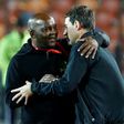 Coaches Pitso Mosimane (L) of Mamelodi Sundowns and Rene Weiler of Al Ahly meet after a CAF Champions League quarter-final first leg in Cairo this year.