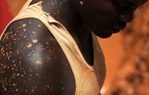 A man working in a gold mine is pictured in 2009 in Chudja, near Bunia, north eastern Congo. An abandoned mine in southeastern Democratic Republic of Congo has collapsed killing eight members of one family including five children, a local government of...