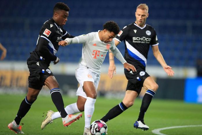 Bayern Munich and Germany winger Serge Gnabry (C) has tested positive for Covid-19