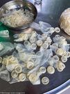 Police seize 324,000 used condoms after raiding a company repackaging them for sale