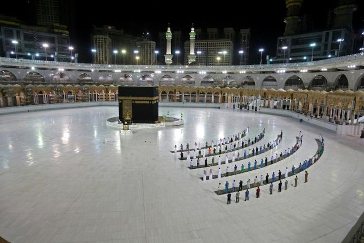 A limited number of worshippers perform prayers at the Kaaba, Islam's holiest shrine, in the Grand Mosque complex in Saudi Arabia's holy city of Mecca