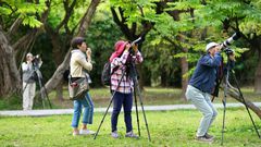 Taiwan bird watchers taking photos at the Da'An Forest Park in Taipei. A Taiwan bird protection group has been ejected from a global body because it refused to sign a statement saying it would never advocate for the island's independence
