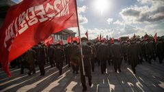 Members of a 12,000-strong volunteer workforce attend a rally to pledge support for a typhoon recovery campaign ordered by North Korea's leader Kim Jong Un at the Kumsusan palace in Pyongyang