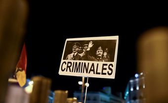A placard depicting German leader of the Nazi party Adolf Hitler and Spanish dictator Francisco brandished in Madrid last year during a protest after Franco's remains were moved from a grandiose state mausoleum to  more discreet grave