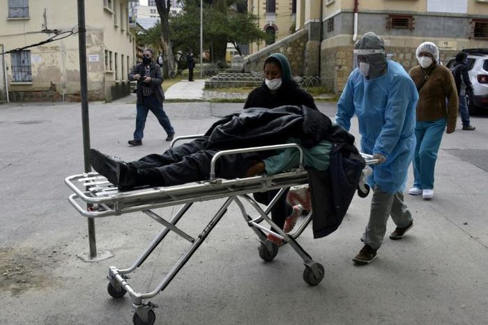 Television stations show images of police recovering corpses from the street on a daily basis, most of which have died from coronavirus