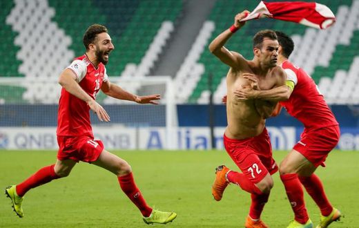 Persepolis forward Issa Alekasir  celebrated his later winner against Al-Sadd
