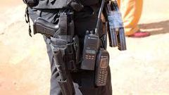 Police officer guarding bank collapses and dies