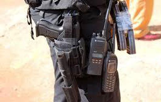 Police officer guarding bank collapses and dies