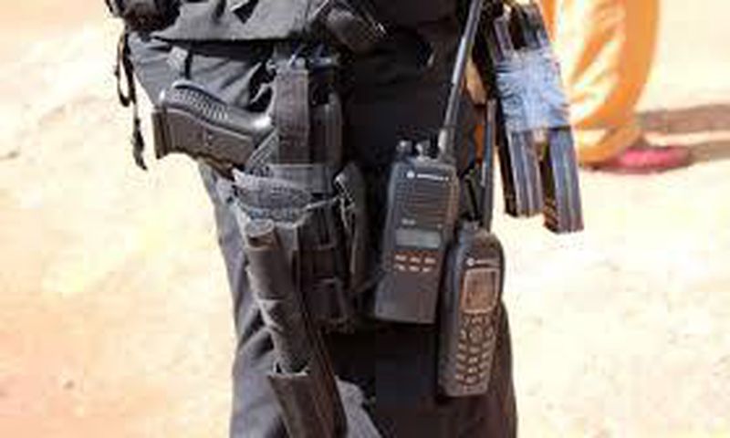 Police officer guarding bank collapses and dies
