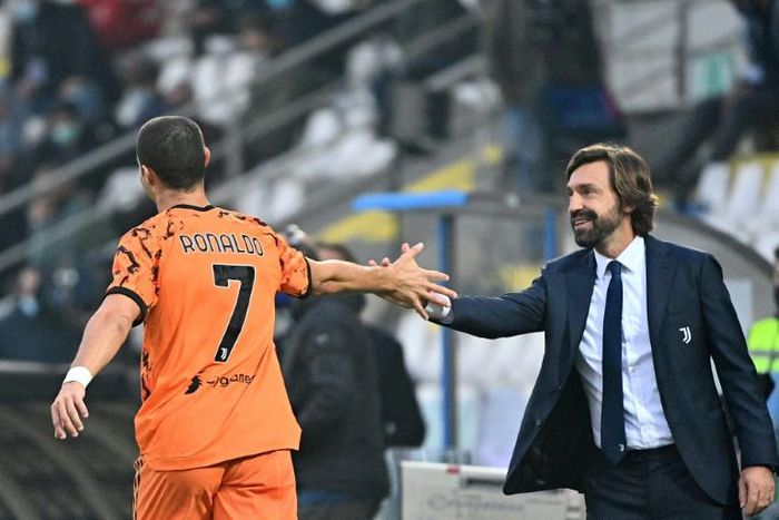 Cristiano Ronaldo (L) scored a double to ease the pressure on Juventus coach Andrea Pirlo (R)