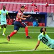 Luis Suarez completed the scoring and an impressive 20-minute debut as Atletico beat Granada 6-1
