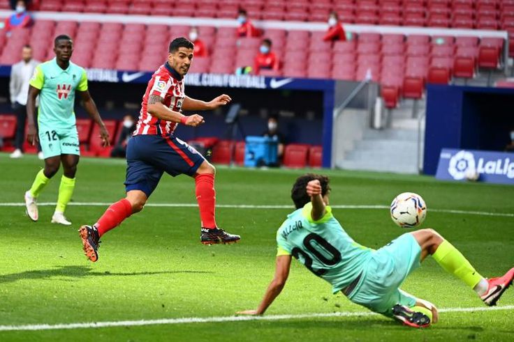 Luis Suarez completed the scoring and an impressive 20-minute debut as Atletico beat Granada 6-1