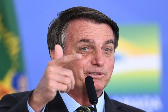 Brazilian President Jair Bolsonaro lashed out again at journalists Monday, a day after threatening to punch a reporter who questioned him about corruption accusations involving the first lady