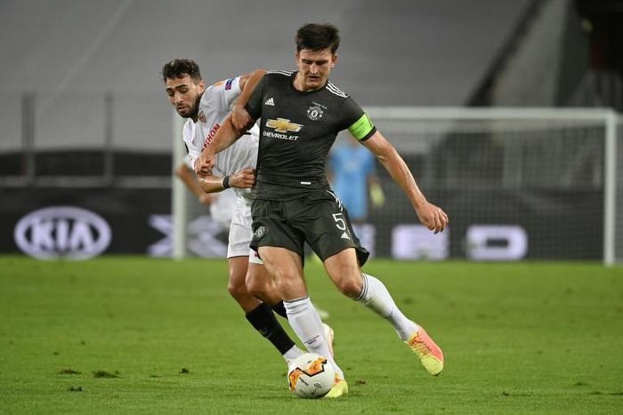 Harry Maguire (R) played in Manchester United's 2-1 loss to Sevilla in the Europa League semi-finals