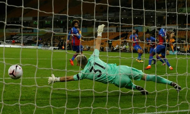 Debut goal - Wolves' French defender Rayan Aït-Nouri (R) scores the opener in Wolves' 2-0 win over Crystal Palace at Molineux