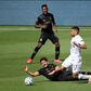Adrien Perez Los Angeles FC reacts as he loses his footing in front of Sebastian Lletget, who was one of the scorers in the LA Galaxy's 2-0 Major League Soccer win over their cross-town rivals