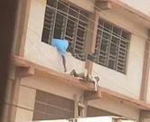 WASSCE 2020: Man captured sneaking “Apor” to students on storey building
