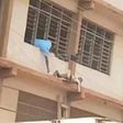 WASSCE 2020: Man captured sneaking “Apor” to students on storey building