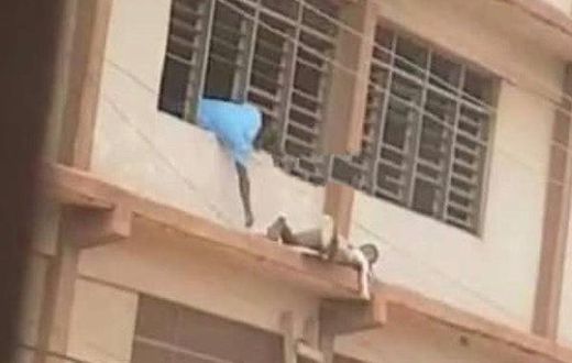WASSCE 2020: Man captured sneaking “Apor” to students on storey building