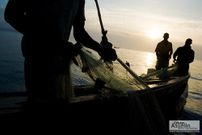 Fishermen rest at night and prepare to set off at dawn
